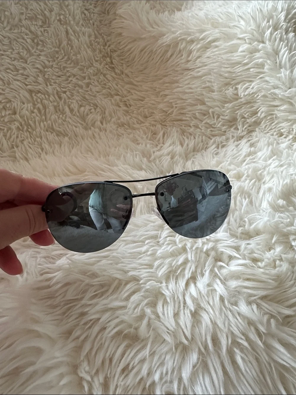 Prada Men’s Black and Silver Rimless Sunglasses